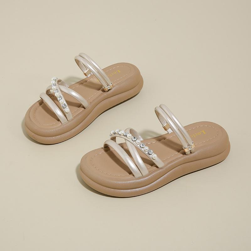 

Two women wearing cool slippers 2025 new summer Korean version fashion one-word pearl thick-soled soft-soled Roman slippers women 41