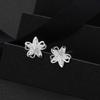 S999 Pure Silver Plum Blossom Earrings: Exquisite, Shiny Korean Fashion Cartilage Sterling Silver Snail Studs for Women.