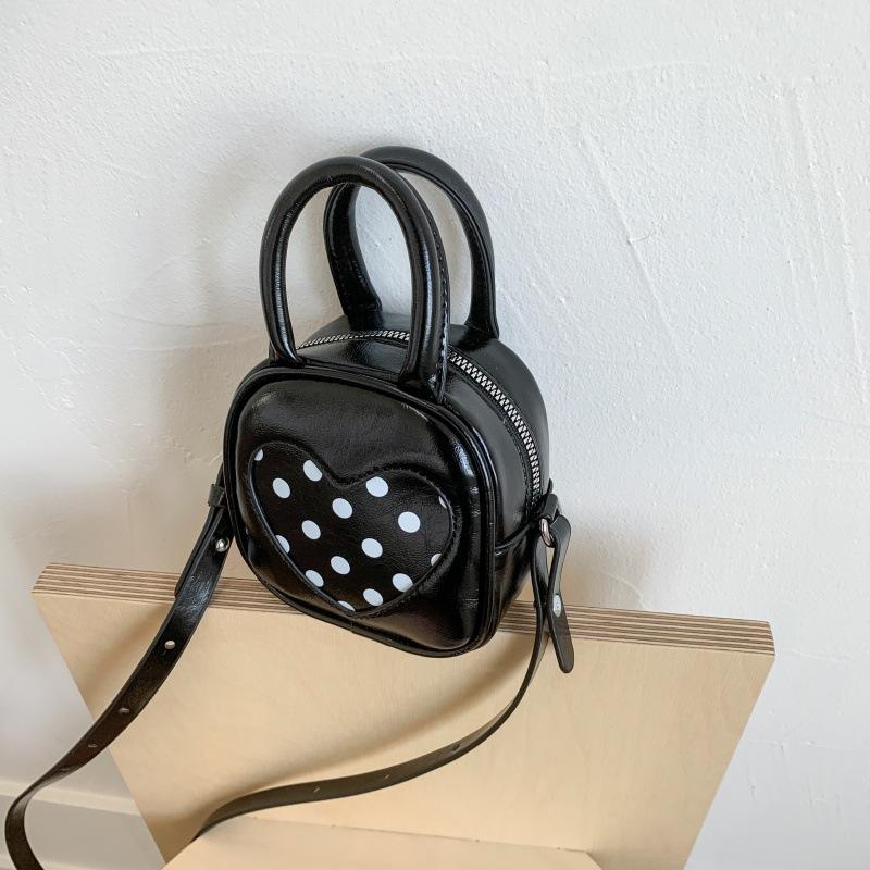 Retro Beulen-Schultertasche Damen 2025 Frühling und Sommer neue kleine Tasche Nische tragbare Bucket Bag