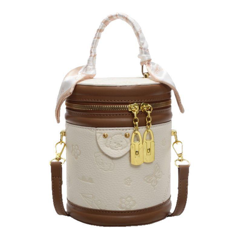 Hot-selling versatile high-end Korean version temperament portable bucket bag niche cute embossed women's messenger bag