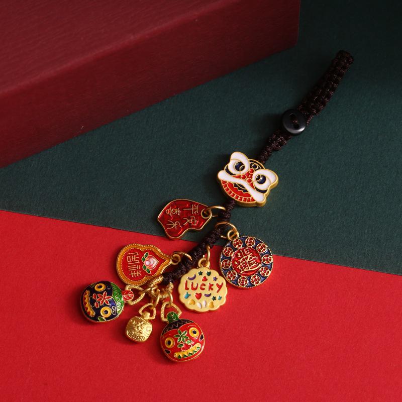 Goldener Glücksschlüsselanhänger: Reichtumsgott verschlingt Goldtier für Familie, perfekt als Auto- oder Handyanhänger.