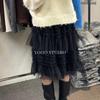 Spring 2026 Essential Korean Style Midi Skirt with Heavy Embroidery, Mesh Layers, and Lace-Up Hem.