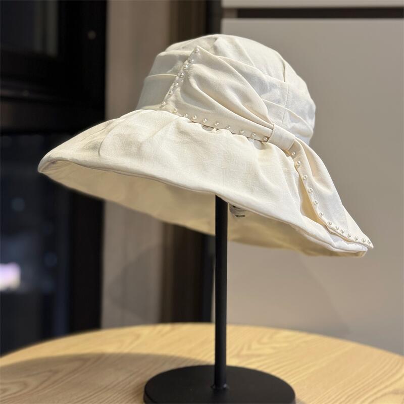 Korean-style bowknot wide-brimmed sun hat for women, summer sun hat that makes the face look smaller, suitable for vacations, outdoor sun protection,
