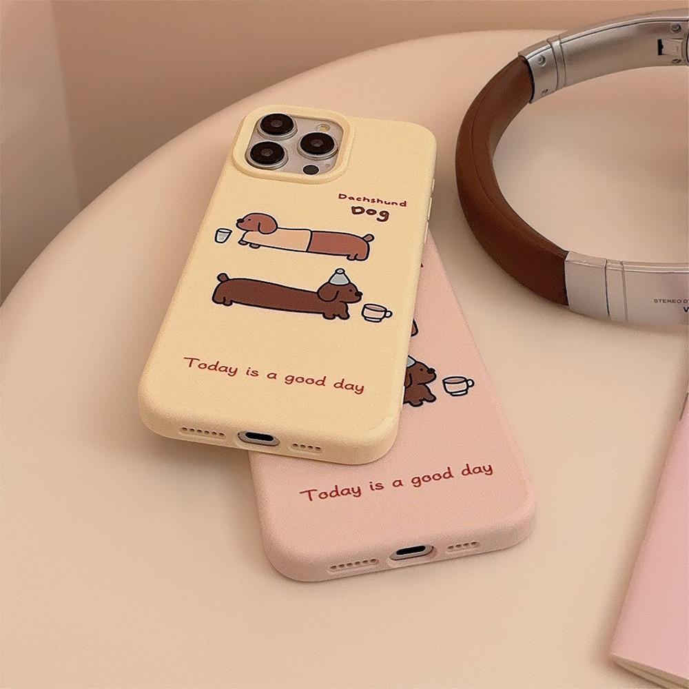 Růžový kreslený pouzdro na telefon s jezevčíkem