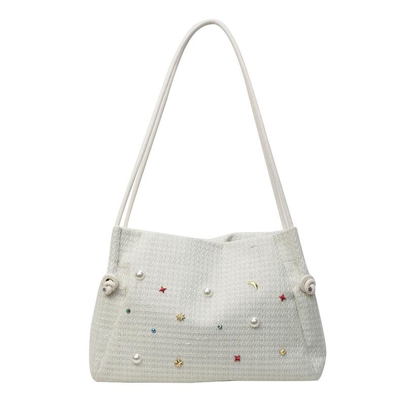 Large-capacity bag women's 2025 spring and summer new fashion woven tote bag simple and versatile commuter shoulder bag