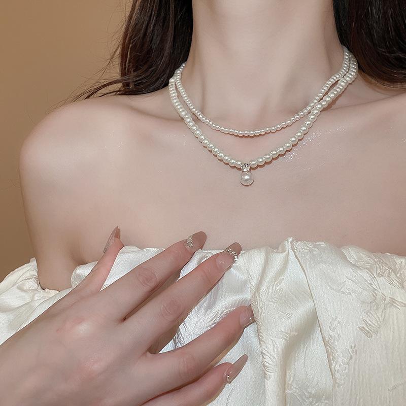 Real gold electroplated pearl beaded bow necklace niche versatile commuter collarbone chain fashion high-end jewelry women