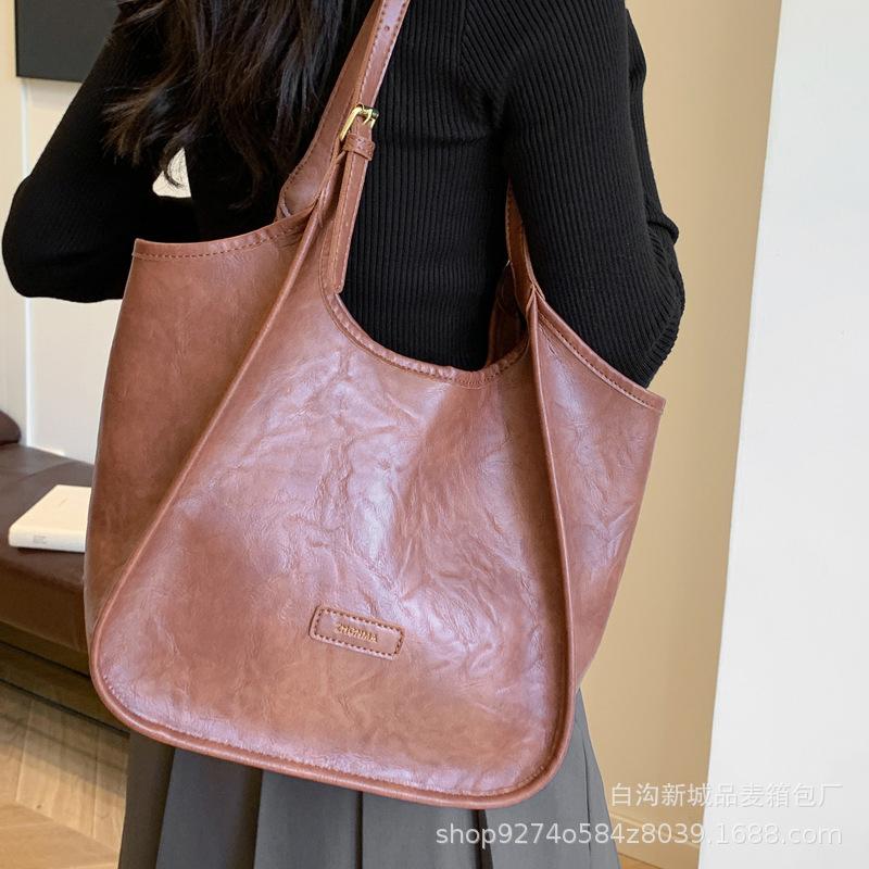 Large Capacity Retro Tote Mother and Child Bag Women's Bag 2025 New Fashion Explosion Shoulder Bag Commuter Armpit Bag