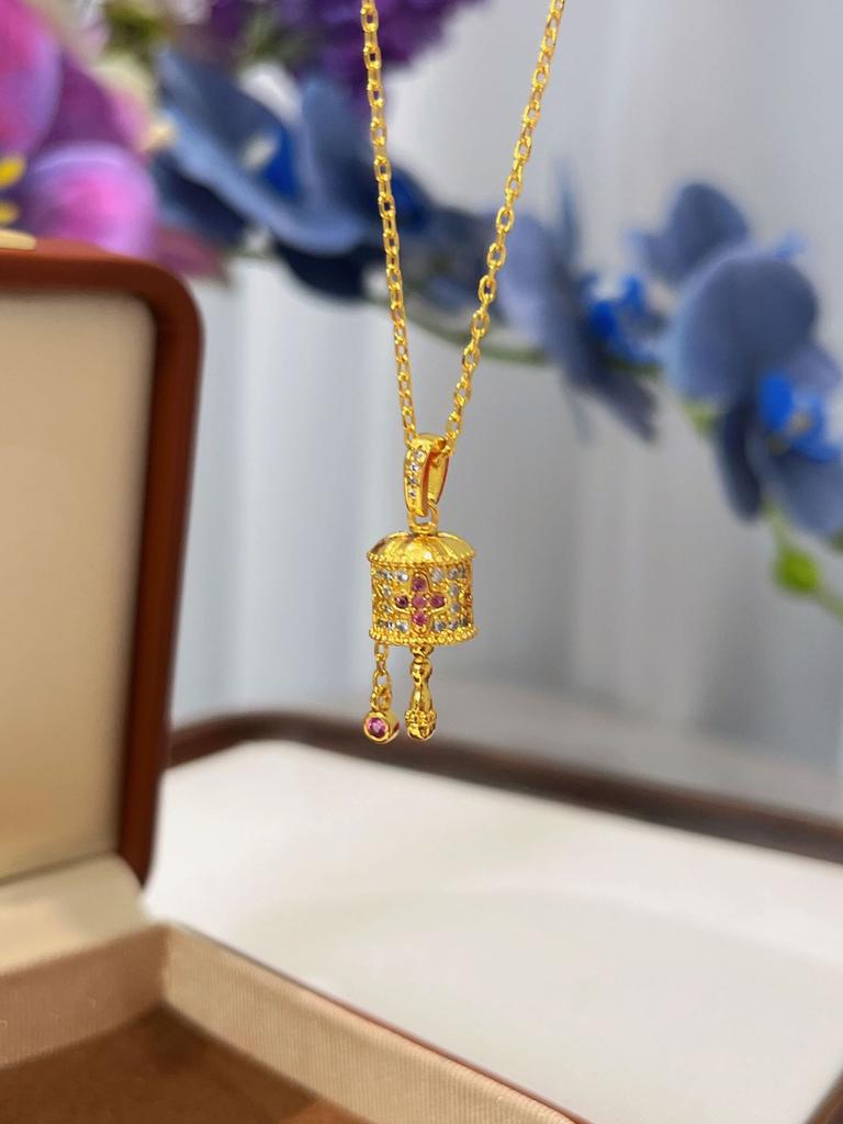 Turn Gold Tube Four-Leaf Flower Collarbone Chain High-End Niche Design Sense Rotatable Necklace