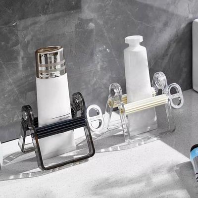 Toothpaste Squeezer Manual Rotating Toothpaste Facial Cleanser Skin Care Products Hair Dye Oil Paint Paste Squeezer Bathroom Acc