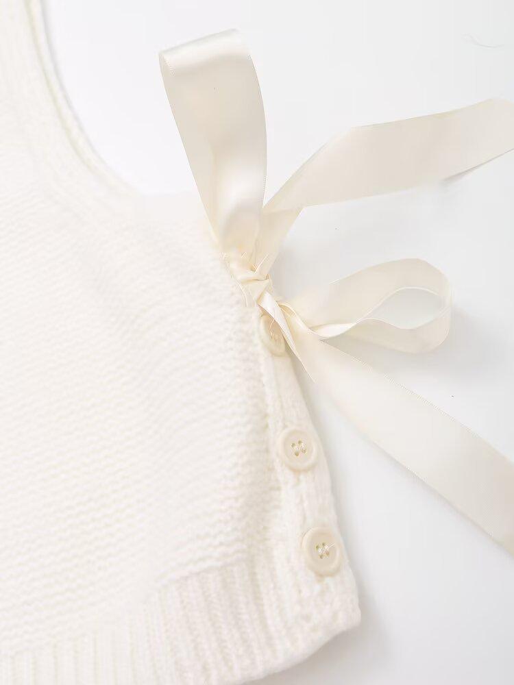 Autumn Women's Fashion: European & American Knitted Sweater Vest with Side Bow Button