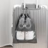 Dustproof & Moisture-proof Non-Woven Shoe Storage Bag with Drawstring for Travel Organization.