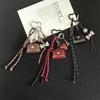 Porta-moedas, clips, porta-chaves – Chaveiros