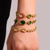 Qiong Yao Oval Czech Glass Stone Bracelet, 18k Gold-Plated Multi-Cut Bread Edge Design, High-Quality, Exquisite Jewelry.