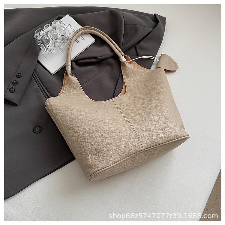 ins Korean version of fashion large-capacity tote bag women's 2025 new versatile hand-held basket bag textured shoulder bag