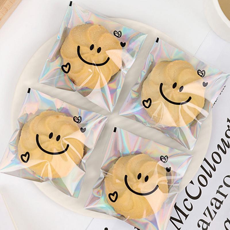 100pcs Cute Smiling Face Self-adhesive Bag Laser Transparent Biscuit Bag Cookie Packaging Bags Birthday Party Baby Shower