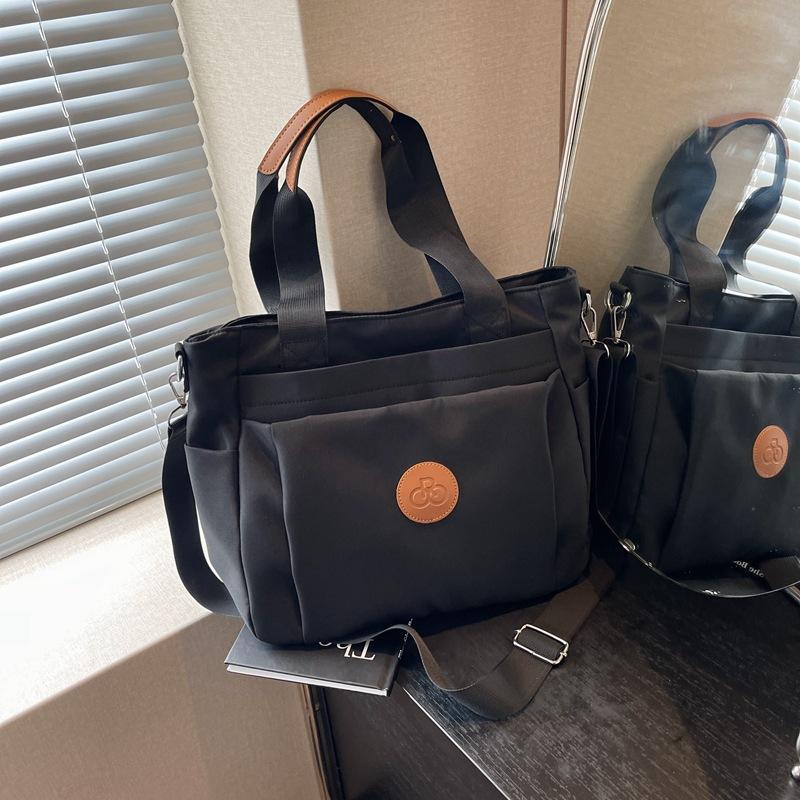 

Большая вместительная сумка 2024 года, новая сумка через плечо, женская сумка для поездок на работу, женская сумка в иностранном стиле, повседневная сумка-тоут чёрный