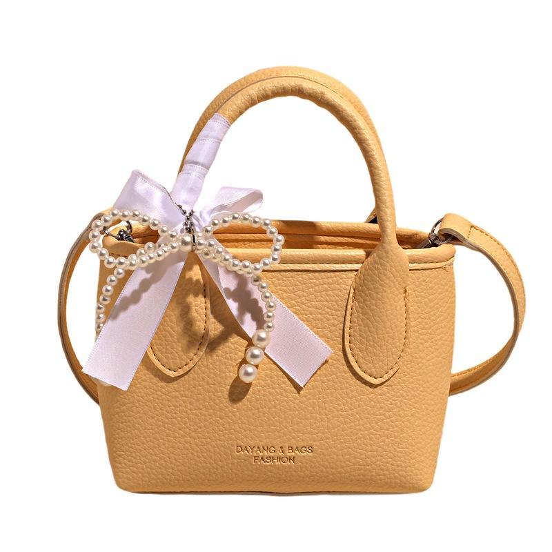 2025 nová mašle perlová kabelka dámská móda ležérní svěží jednoduchá ramenní crossbody niche design taška