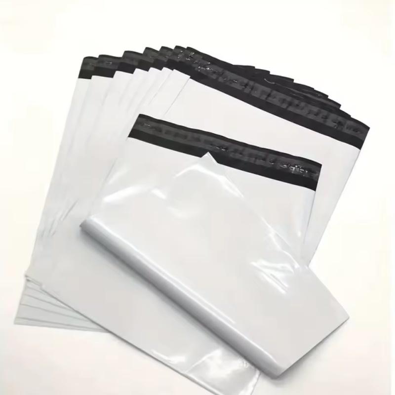 

50 шт. Пакеты-конверты Пластиковые экспресс-конверты Сумки для хранения Белый цвет Почтовые пакеты Самоклеящийся замок Курьерский пакет 17X30CM 50pcs