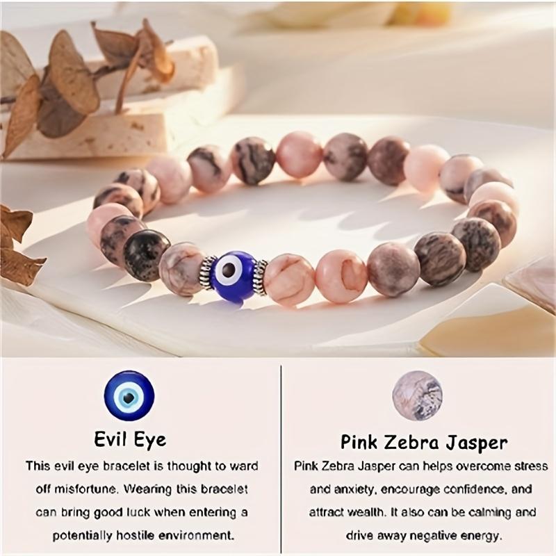 Handgefertigtes Armband aus rosa Natursteinperlen mit einzigartigen blauen Perlen in Teufelsaugenform, exquisiter Schmuck zum Anfassen