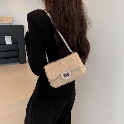 Nuova borsa a tracolla in denim monocolore alla moda, fresca ed elegante, con catena personalizzata con lucchetto, da donna