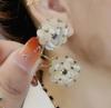 Fashion Geometric Bow Flower Pearl Earrings Women'S Premium Versatile Small Fragrant Wind Earrings