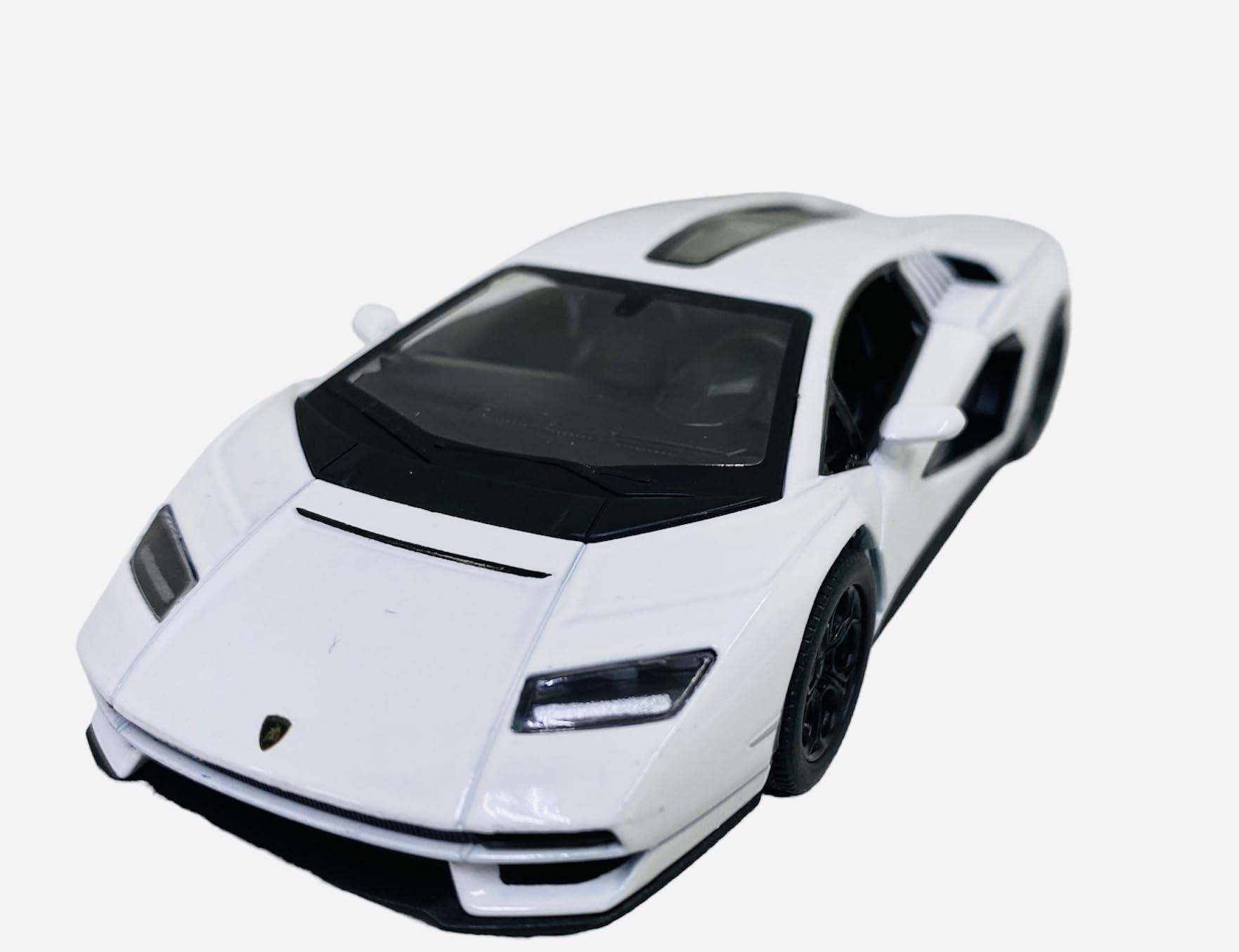 

Kinsmart Lamborghini Countach масштаб белый LPI800-4 138
