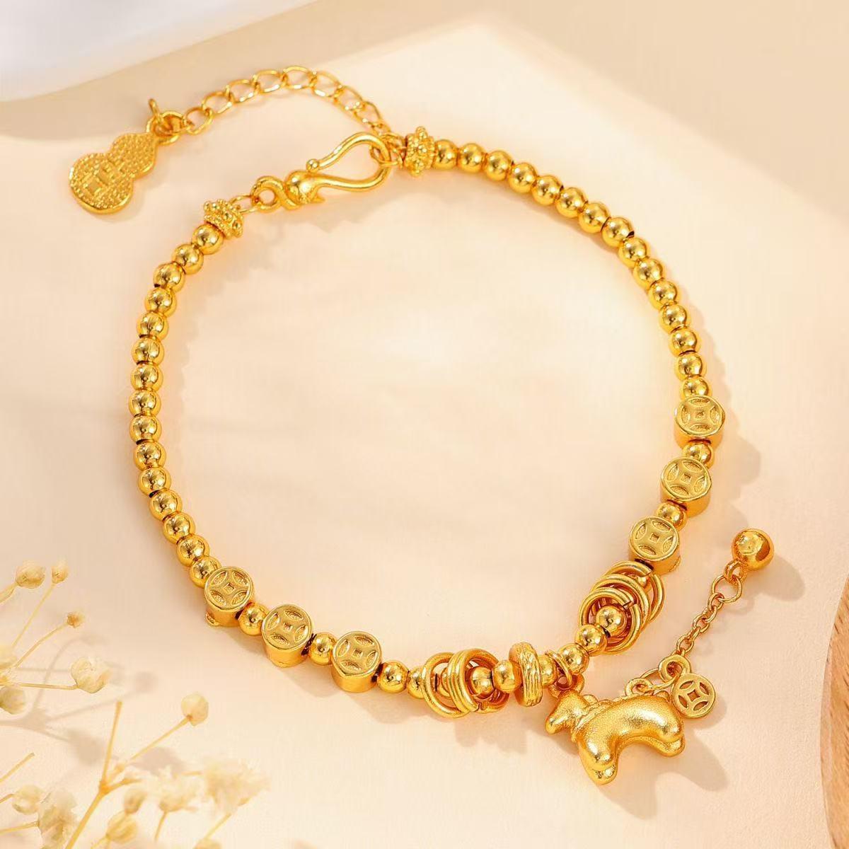 

Женский браслет-спираль из монет и бусин с золотым покрытием - Нишевая роскошная бижутерия