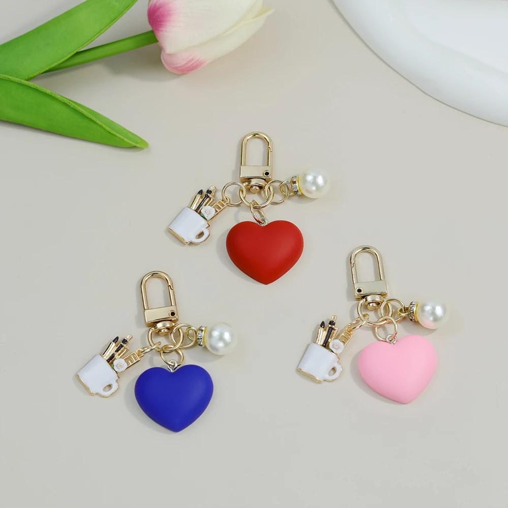 Bunte herzförmige Schlüsselanhänger mit Perlenstift-Behälter-Anhänger Schlüsselring Damen Geldbörsen-Taschen-Ornamente Auto-Schlüsselhalter-Zubehör
