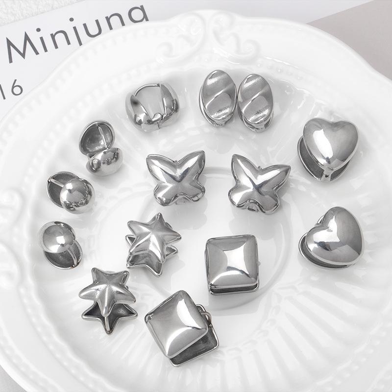 

Unisex Titanium Steel Geometric Earrings: Oval, Star, Heart Designs