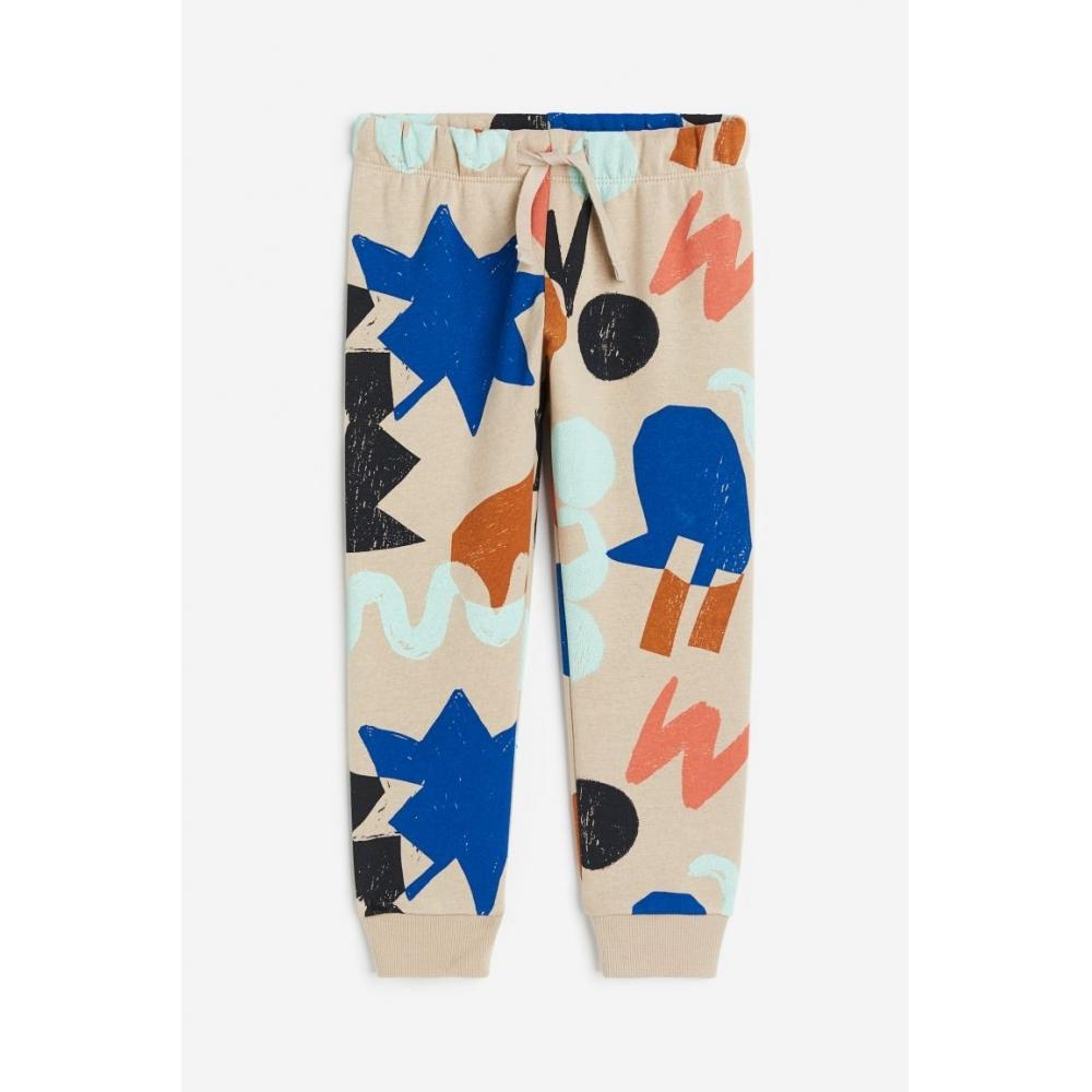 

Брюки-джоггеры с принтом HM светло-бежевые с рисунком