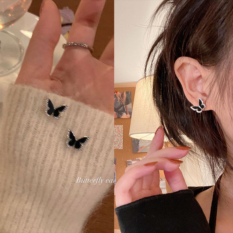 

Autumn and winter black butterfly stud earrings women s new trendy niche design sense light luxury high-end earrings earrings explosion