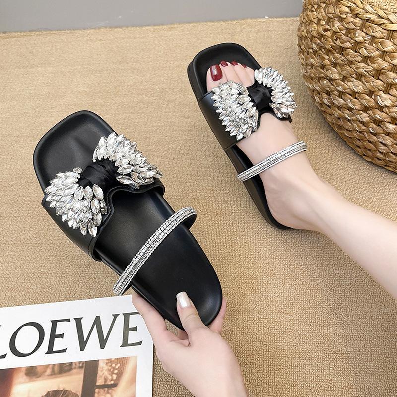 Slippers women's summer outer wear fashion 2025 new French rhinestone bow with skirt flat-bottomed beach cool slippers