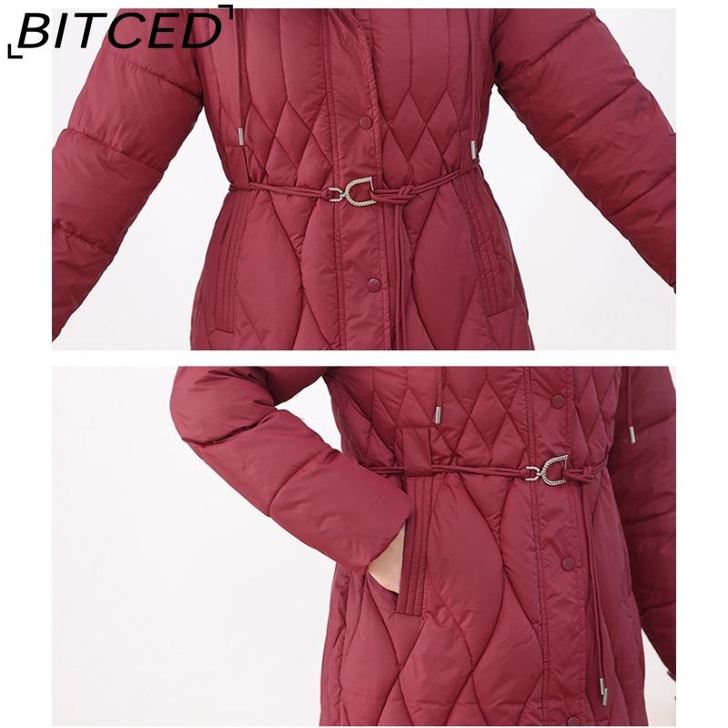 BITCED Women's Long-Length Winter Coat with Hood and Drawstring Waistband Fitted and Flattering Silhouette for a Slimming Effect