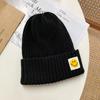 Smiley face label wool hat female autumn and winter warm bag head couple trendy brand cold hat solid color student male knitted hat