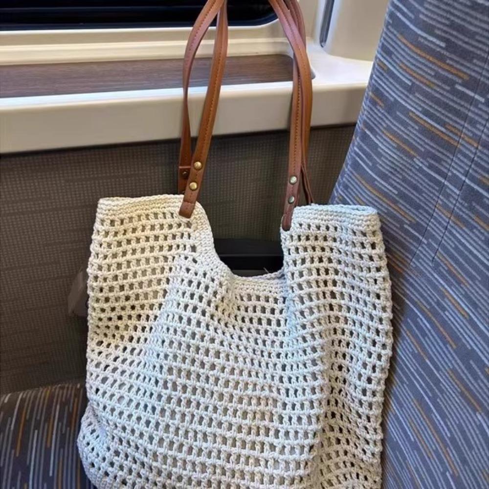 Summer straw bag woven bag 2025 new lazy wind French hollow grid large capacity seaside shoulder beach bag