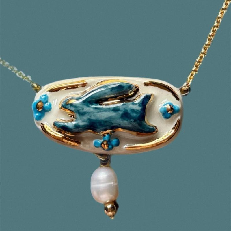 

New Chinese-Style White Jade Rabbit Running Engraved Simple Literary And Retro Stainless Steel Pendant Necklace Jewelry