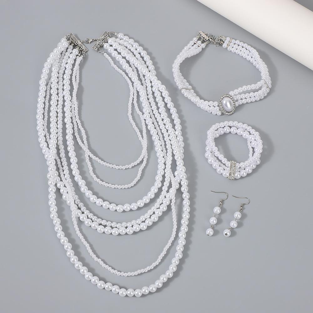 

Layered Pearl Necklace and Earring Set , Geometric Minimalist Design , Trendy Light Jewelry for Women білий