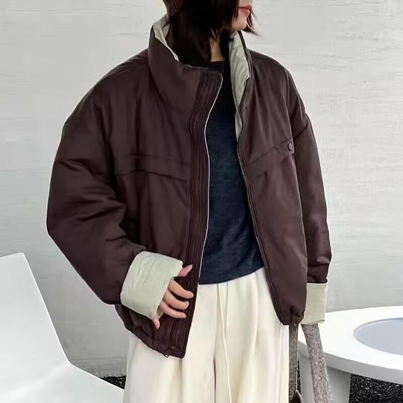 

Casual versatile contrasting color splicing padded cotton stand-up collar long-sleeved jacket for women s 2025 autumn and winter new loose large-size L темно-коричневого кольору