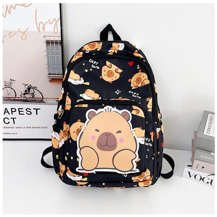 Schoolbag backpack new 1011 cartoon cute printing large capacity high value college style casual simple spine protection schoolbag