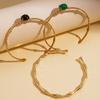 Elegante bracciale rigido aperto in acciaio al titanio e pietra naturale per donna