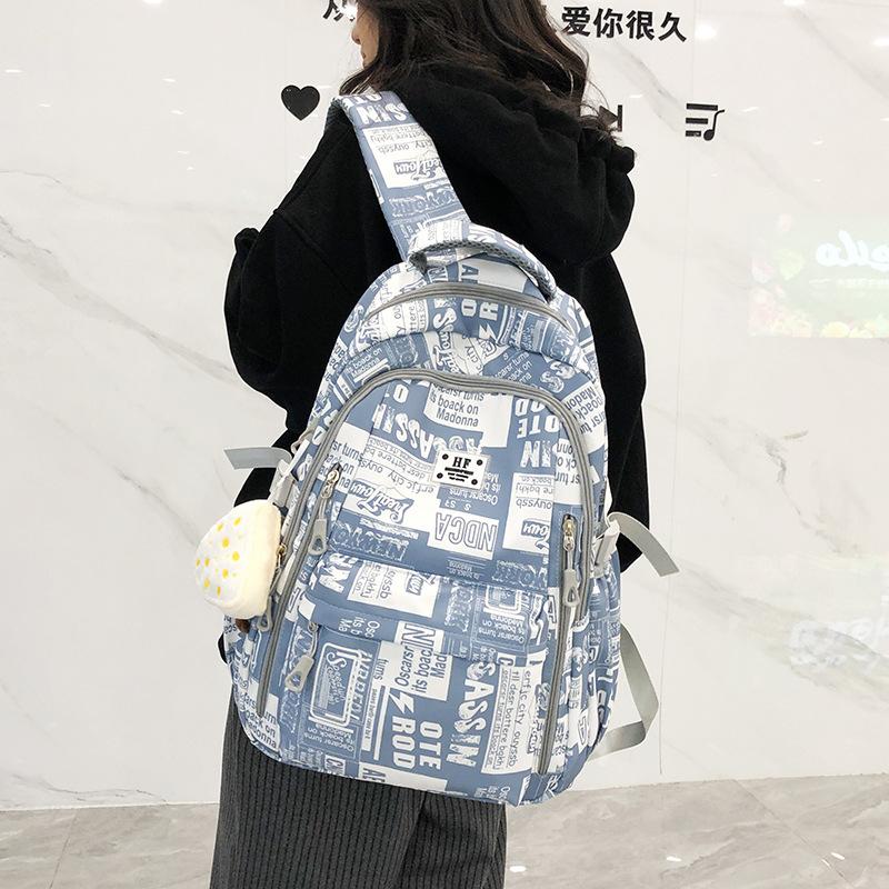 High-value Graffiti Schoolbag Male Korean Version Student Junior High School High School Student Backpack Male Campus Large-capacity Backpack Female
