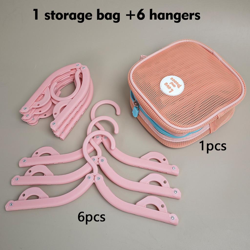 

Portable Travel Collapsible Plastic Clothes Hanger With Storage Bag For Suitcase And Dorm Use Pink Excluding Clips