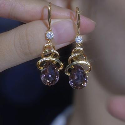 Korean Style Rhinestone Twisted Water Drop Ear Cuff: Unique, Versatile, Sparkly Earrings for Light Luxury and High-End Style.