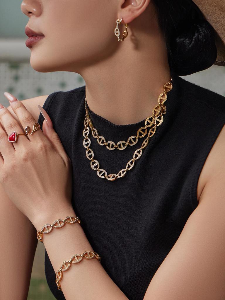 European & American Fashion 18K Gold-Plated Jewelry Set: Ultra-Sparkling Diamond Design with Necklace, Bracelet, and Earrings.