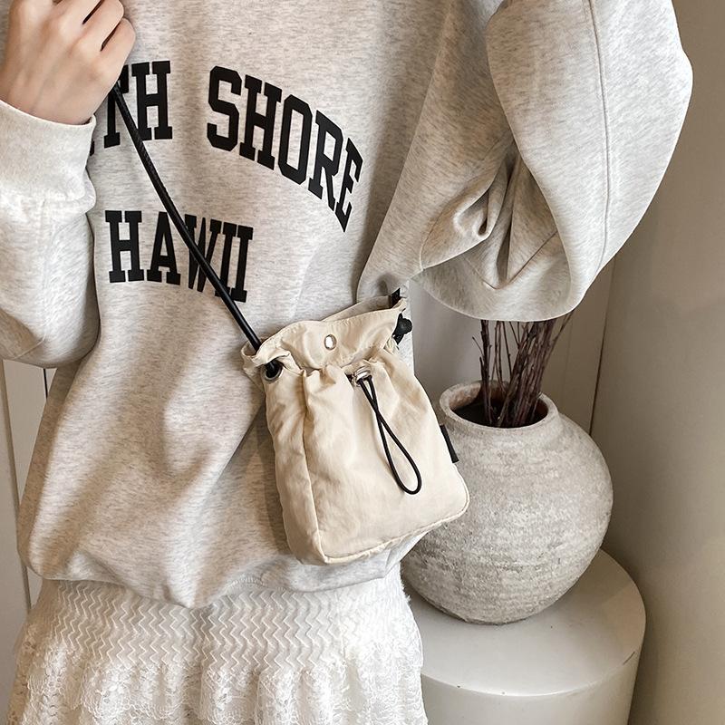 Minimalist Sports Style Mobile Bag for Women 2026 New Drawstring Canvas Small Bag Versatile Mini Crossbody Bag Coin Purse