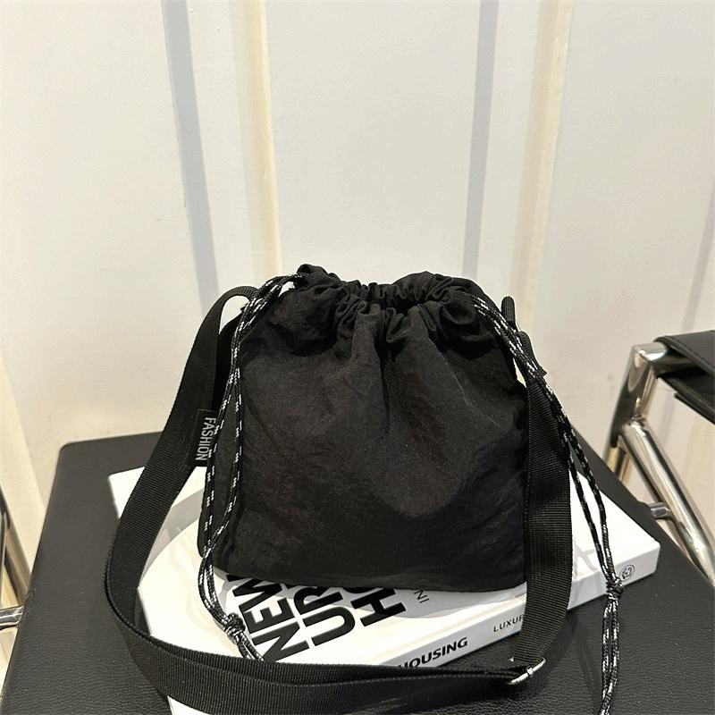Trendy Large Capacity Women's Casual Shoulder Bag | Solid Color, Drawstring Closure, Polyester Lined, Durable Material, Korean Fashion