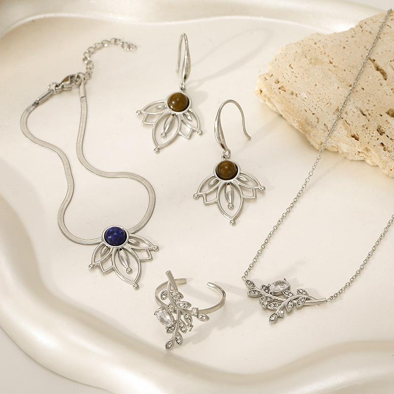 European and American titanium steel natural stone jewelry set, leaf zircon necklace, ring earrings, women's niche high-end sense does not fade
