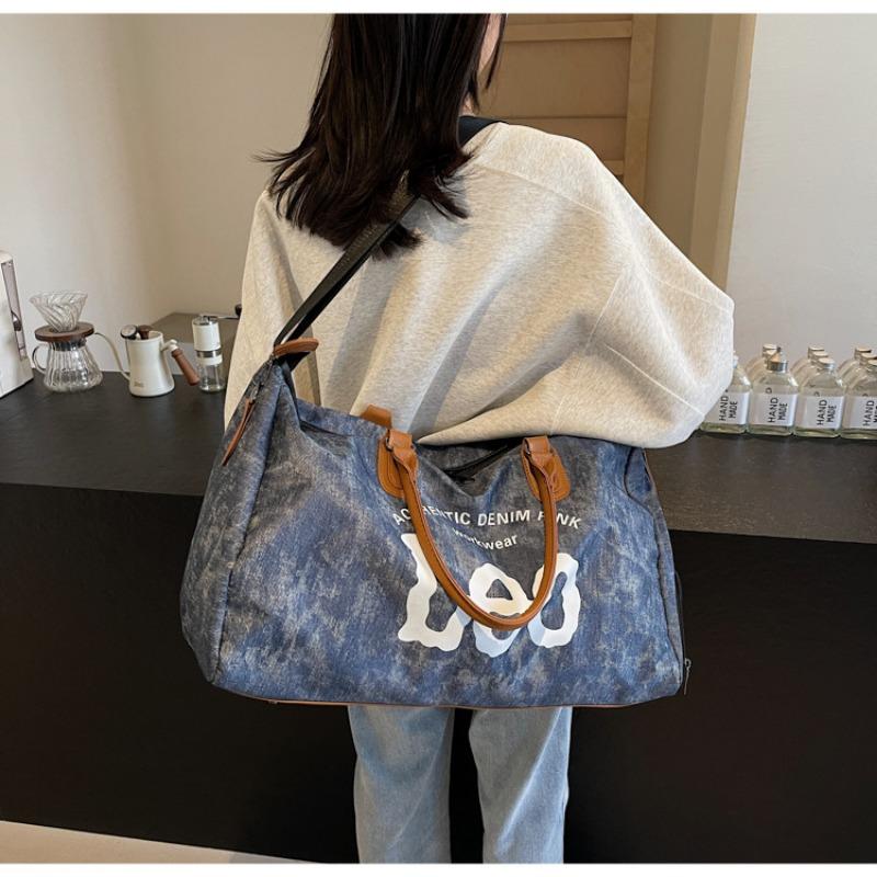 Large capacity cloth bag women's new versatile casual messenger business travel luggage commuter hand-held travel bag