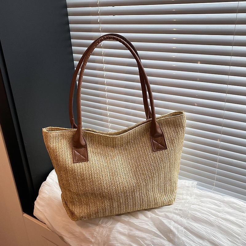 Retro woven contrasting color bucket bag 2025 spring new fashion trend women's shoulder tote bag beach vacation