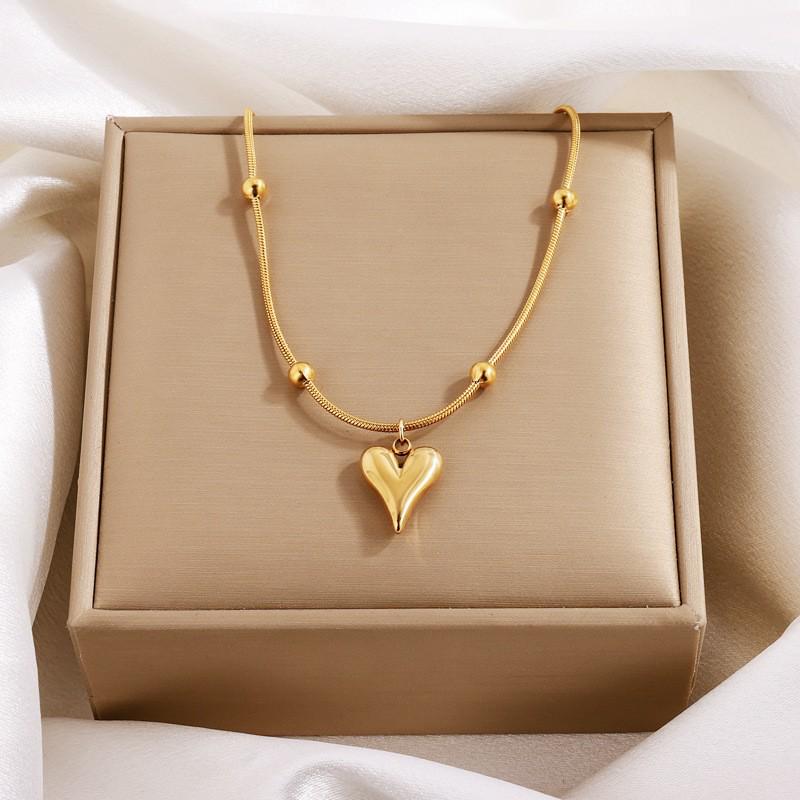 Elegant Titanium Heart Necklace - Light Luxury Women's Stainless Steel Jewelry, European & American Niche Design.